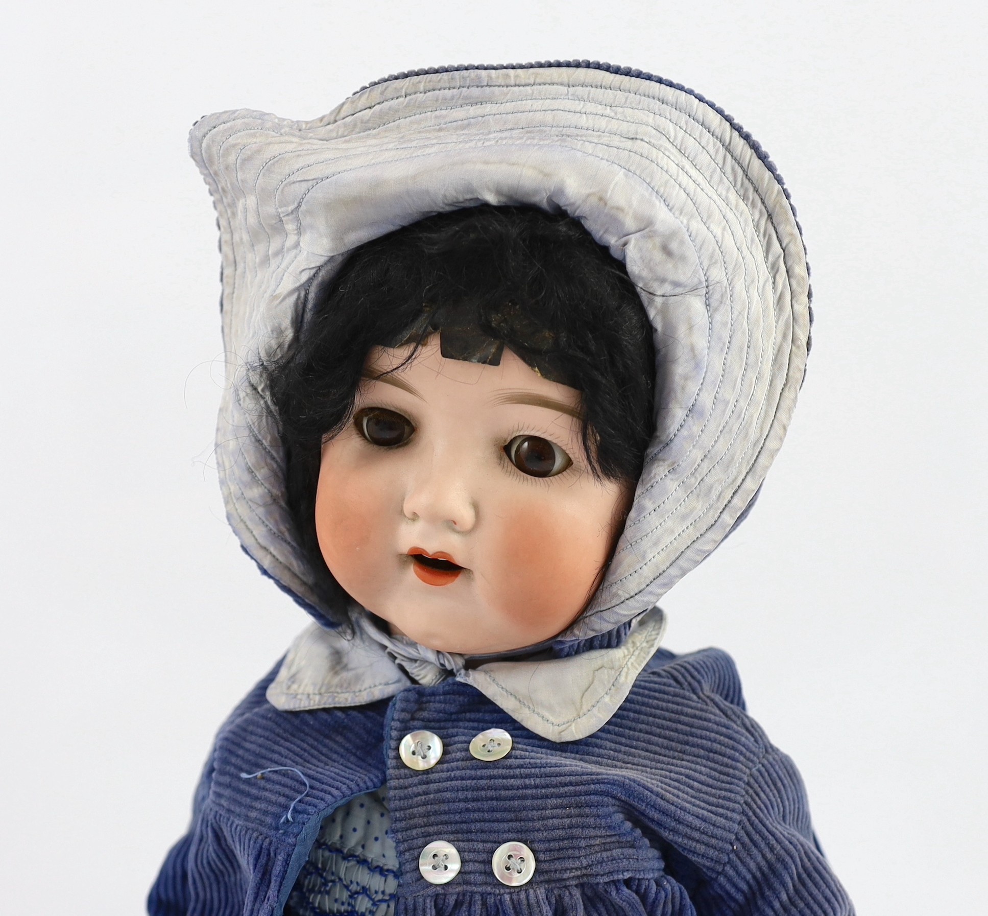 An Armand Marseille bisque doll, 19in.